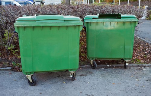 Skip hire service being loaded with waste