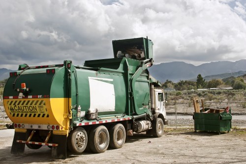 Skip hire vehicle parked outside a residential property in Chessington
