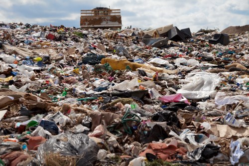 Different types of construction waste being handled by professionals